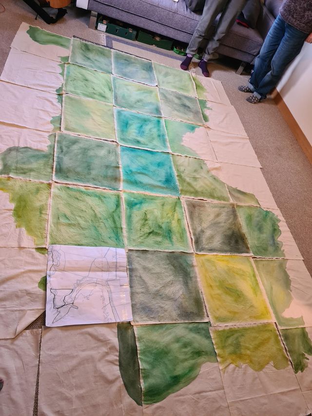 Colorful tapestry squares showing field areas